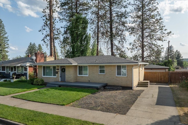 5615 N Forest Blvd, Spokane, WA 99205 - ranch-style house with a chimney and brick siding