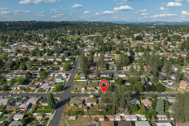 5615 N Forest Blvd, Spokane, WA 99205 - aerial view of property's location featuring a mountain backdrop and nearby suburban area
