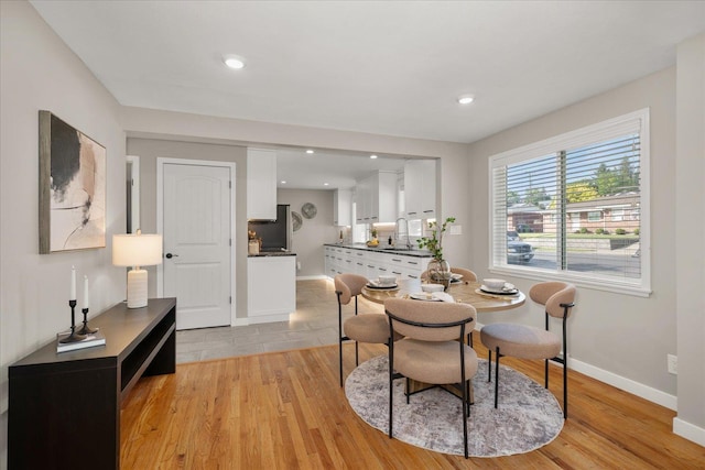 5615 N Forest Blvd, Spokane, WA 99205 - dining space with light wood finished floors and recessed lighting