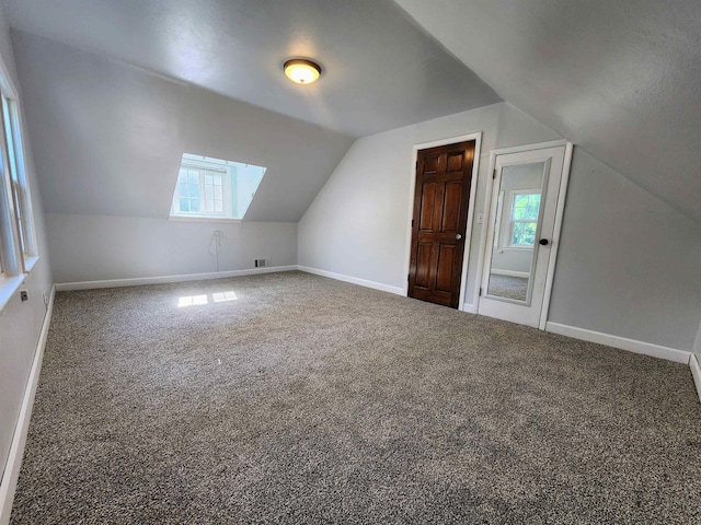 4107 N Bessie Rd, Spokane, WA 99212 - bonus room with lofted ceiling, plenty of natural light, and carpet flooring