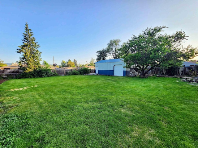 4107 N Bessie Rd, Spokane, WA 99212 - fenced backyard with an outbuilding and a detached garage