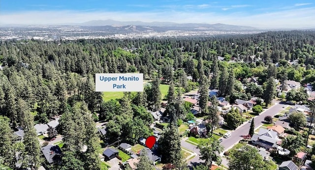8 W 26th Ave, Spokane, WA 99203 - view of property location with a forest and a mountain backdrop