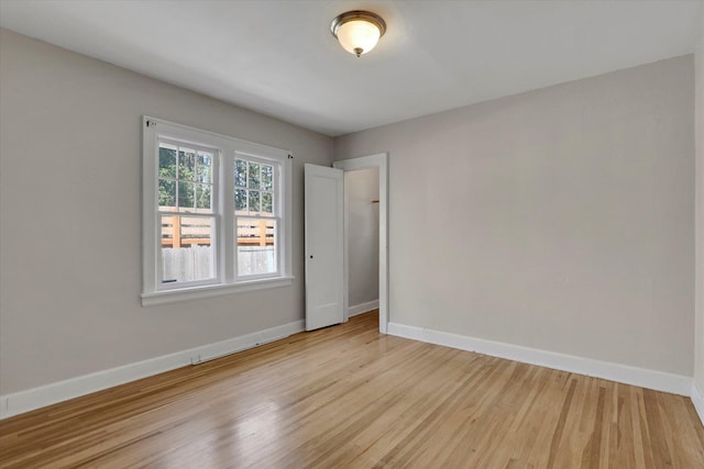 8 W 26th Ave, Spokane, WA 99203 - unfurnished room featuring baseboards and wood finished floors