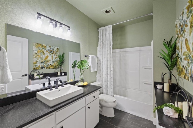 1409 E 36th Ave, Spokane, WA 99203 - bathroom with a textured wall, vanity, tile patterned floors, and shower / tub combo with curtain