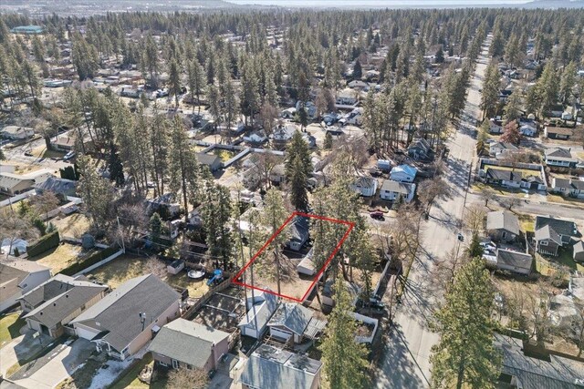 1409 E 36th Ave, Spokane, WA 99203 - aerial overview of property's location with property boundaries highlighted and nearby suburban area