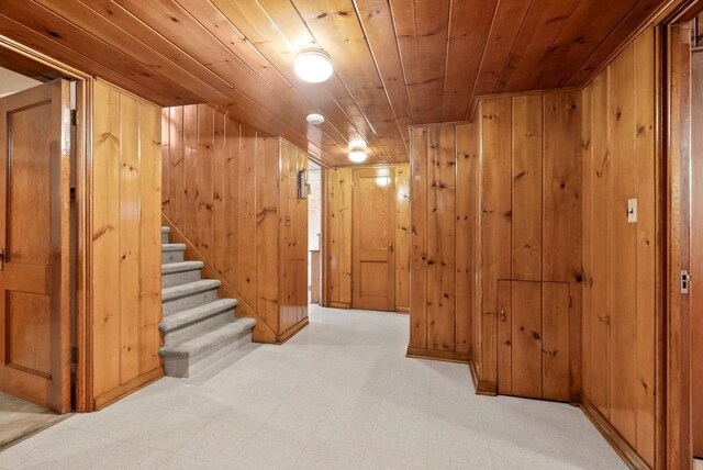 1827 S Arthur St, Spokane, WA 99203 - finished below grade area featuring wooden ceiling, light flooring, wood walls, and stairs
