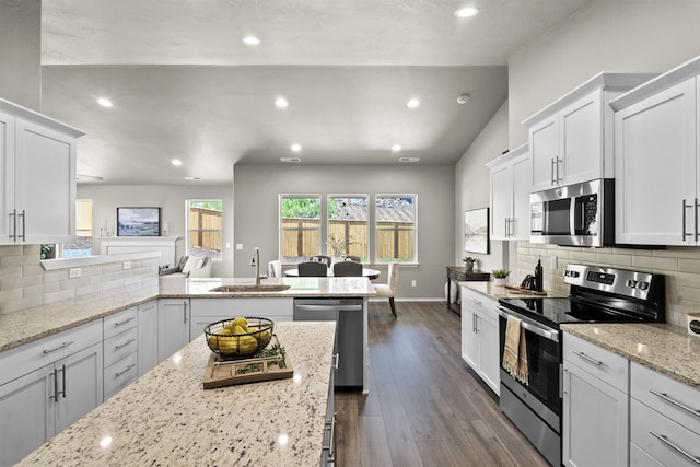 18126 E Barclay Ct Unit 3/4Snowbrush, Spokane Valley, WA 99016 - kitchen featuring stainless steel appliances, recessed lighting, white cabinetry, dark wood-type flooring, and decorative backsplash