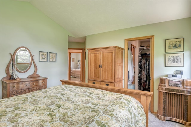 4307 S Apollo St, Spokane, WA 99223 - carpeted bedroom featuring a walk in closet, a closet, and lofted ceiling