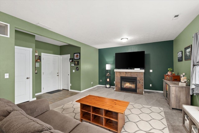 4031 S Bates Rd, Spokane Valley, WA 99206 - living area with a tiled fireplace and light carpet