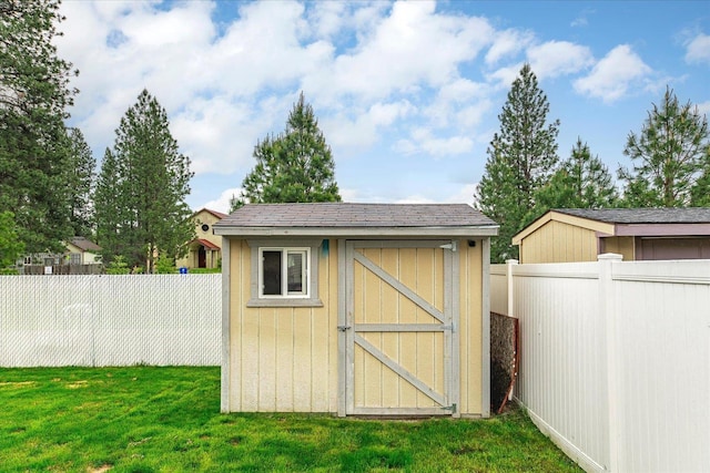 4031 S Bates Rd, Spokane Valley, WA 99206 - view of shed with a fenced backyard