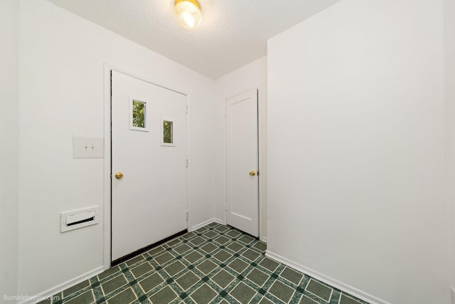 1306 W Joseph Ave, Spokane, WA 99205 - foyer entrance featuring baseboards