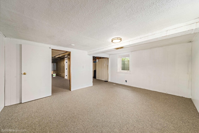1306 W Joseph Ave, Spokane, WA 99205 - unfurnished room featuring carpet and a textured ceiling