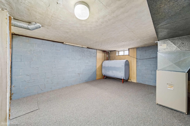 1306 W Joseph Ave, Spokane, WA 99205 - below grade area featuring oil tank and carpet flooring