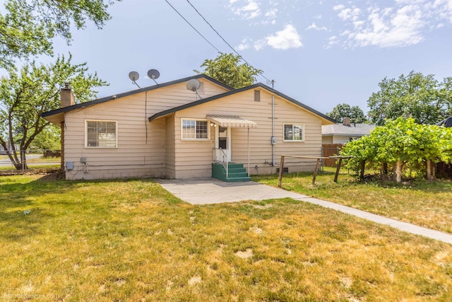 1306 W Joseph Ave, Spokane, WA 99205 - back of house with a patio area and a chimney
