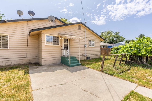 1306 W Joseph Ave, Spokane, WA 99205 - back of house with a patio area