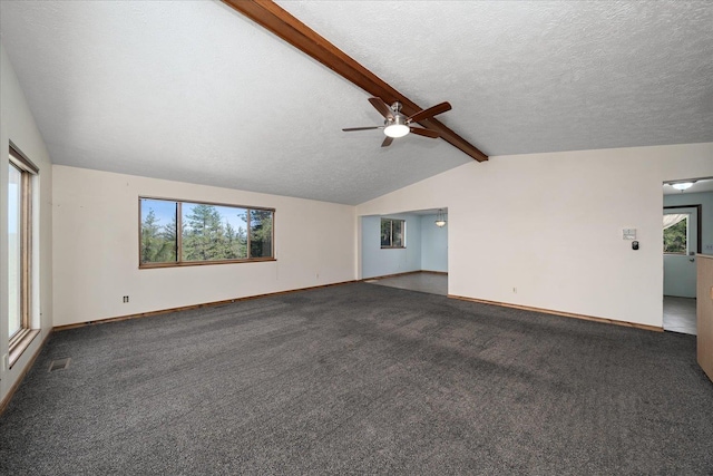 5919 E Grouse Rd, Chattaroy, WA 99003 - unfurnished living room featuring a ceiling fan, dark carpet, and a textured ceiling