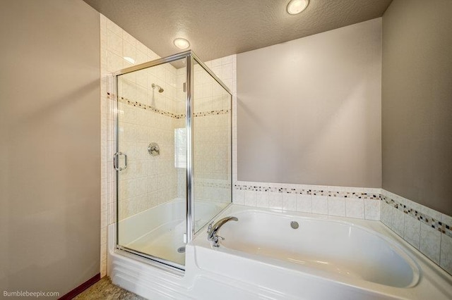 20051 E Meyers Ave, Liberty Lake, WA 99019 - bathroom with a bath, a stall shower, a textured ceiling, and recessed lighting