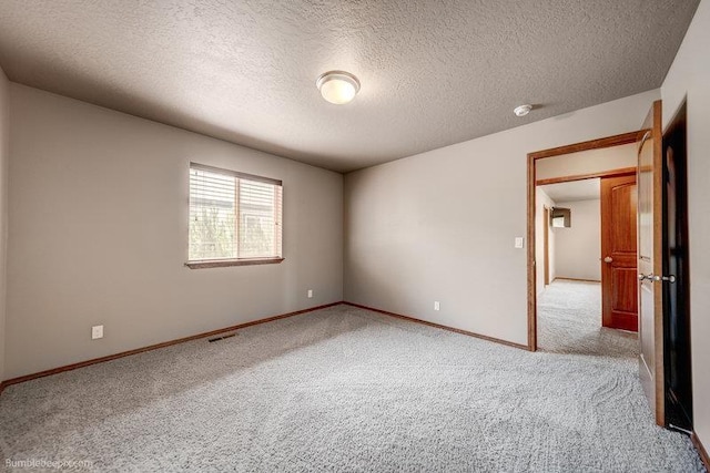 20051 E Meyers Ave, Liberty Lake, WA 99019 - empty room featuring light colored carpet and a textured ceiling