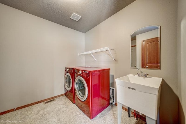 20051 E Meyers Ave, Liberty Lake, WA 99019 - washroom featuring separate washer and dryer and a textured ceiling