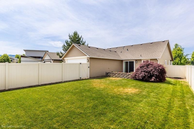 20051 E Meyers Ave, Liberty Lake, WA 99019 - fenced backyard featuring an attached garage