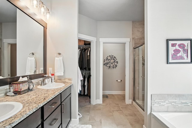 2630 S Fairmont Estates Ct, Greenacres, WA 99016 - bathroom featuring a shower stall, double vanity, a spacious closet, and a bath