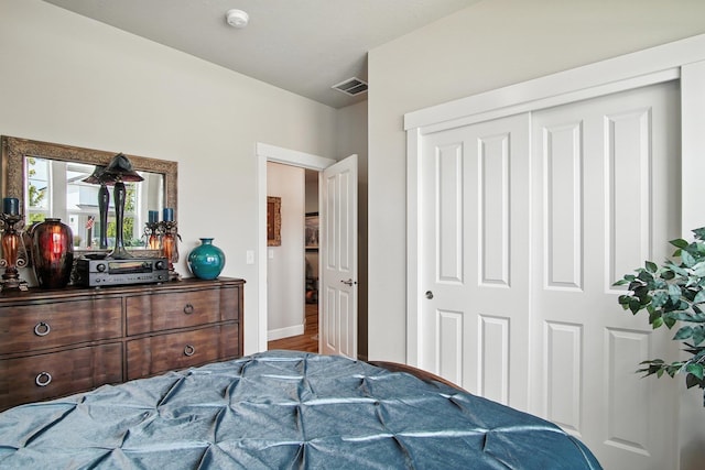 2630 S Fairmont Estates Ct, Greenacres, WA 99016 - bedroom with a closet and wood finished floors