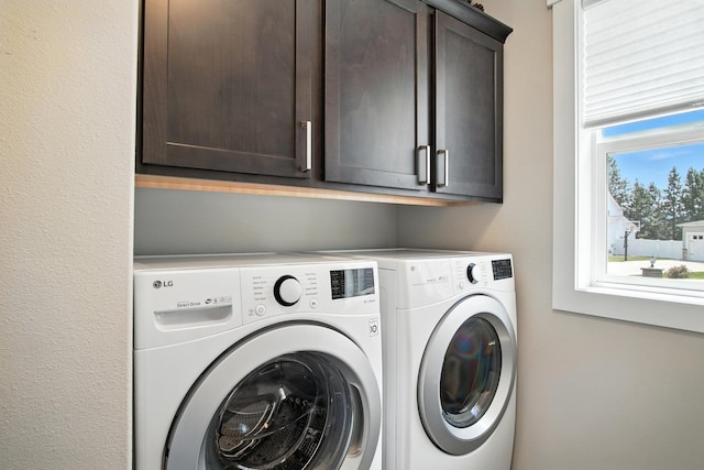 2630 S Fairmont Estates Ct, Greenacres, WA 99016 - washroom featuring cabinet space and washer and clothes dryer