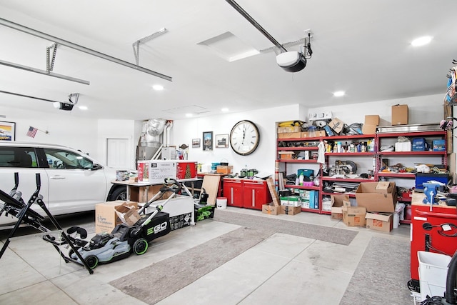2630 S Fairmont Estates Ct, Greenacres, WA 99016 - garage featuring a garage door opener and recessed lighting