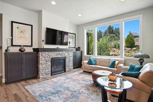 2630 S Fairmont Estates Ct, Greenacres, WA 99016 - living area featuring light wood-type flooring, a fireplace, and recessed lighting