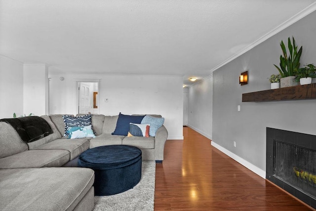 844 W Cliff Dr Unit 206, Spokane, WA 99204 - living room with crown molding, wood finished floors, and a fireplace