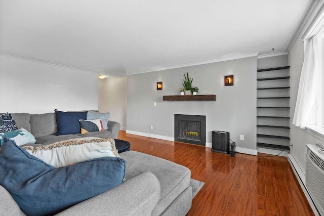 844 W Cliff Dr Unit 206, Spokane, WA 99204 - living area with wood finished floors, a fireplace, crown molding, stairs, and baseboard heating