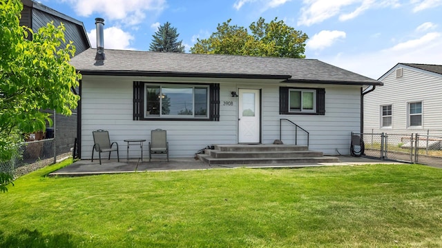 3908 E 26th Ave, Spokane, WA 99223 - rear view of house featuring a fenced backyard, a patio area, a shingled roof, and a gate