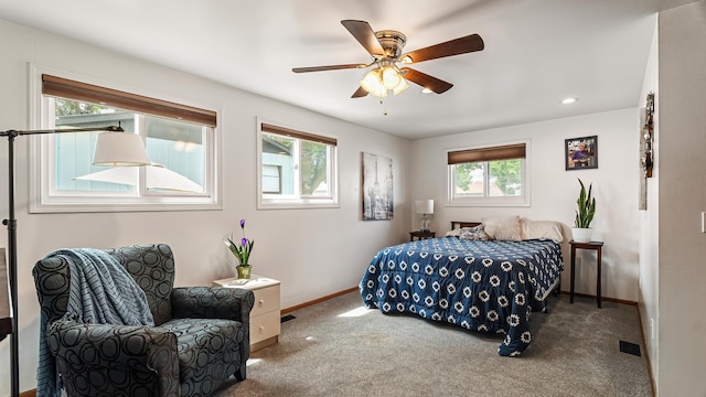 3908 E 26th Ave, Spokane, WA 99223 - carpeted bedroom featuring baseboards and a ceiling fan