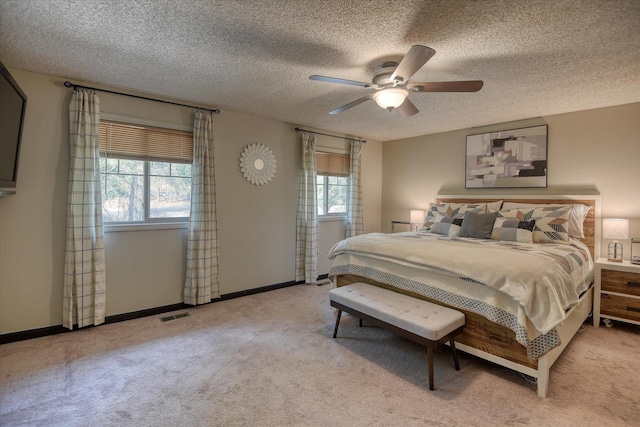 12720 E Kiowa Ct, Spokane Valley, WA 99206 - carpeted bedroom featuring a ceiling fan and a textured ceiling