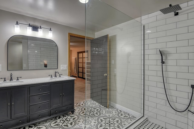 12720 E Kiowa Ct, Spokane Valley, WA 99206 - full bathroom with walk in shower, double vanity, and tile patterned floors