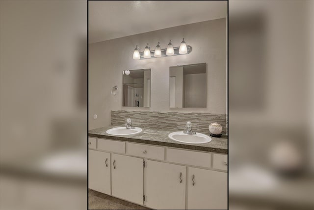 12720 E Kiowa Ct, Spokane Valley, WA 99206 - bathroom with double vanity and decorative backsplash