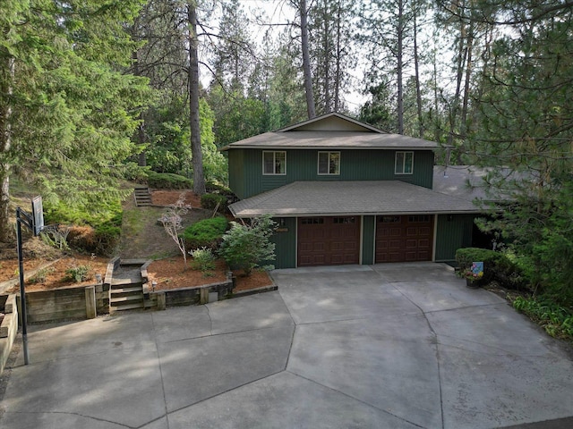 12720 E Kiowa Ct, Spokane Valley, WA 99206 - view of front facade with an attached garage, roof with shingles, and concrete driveway