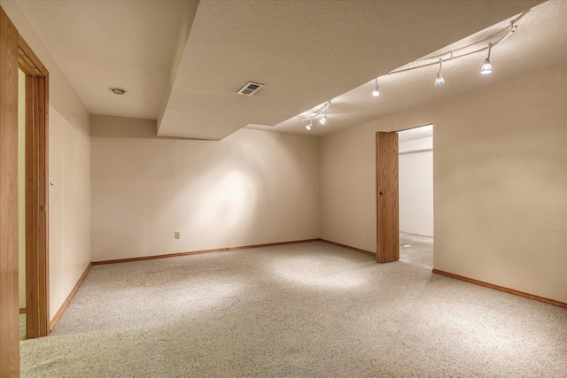 8410 N Pine Meadows Ln, Nine Mile Falls, WA 99026 - unfurnished room featuring baseboards and track lighting