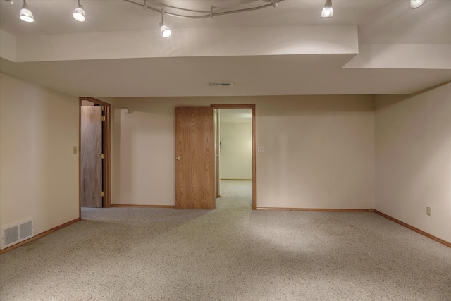 8410 N Pine Meadows Ln, Nine Mile Falls, WA 99026 - empty room featuring baseboards and rail lighting