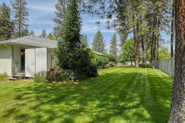 8410 N Pine Meadows Ln, Nine Mile Falls, WA 99026 - fenced yard featuring entry steps