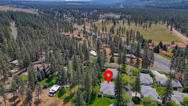 8410 N Pine Meadows Ln, Nine Mile Falls, WA 99026 - aerial view of property's location with a forest and nearby suburban area