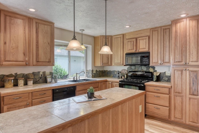 8410 N Pine Meadows Ln, Nine Mile Falls, WA 99026 - kitchen with black appliances, light wood finished floors, decorative light fixtures, a textured ceiling, and recessed lighting