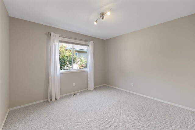 4216 S Tenfel Ln, Spokane, WA 99223 - empty room featuring carpet floors