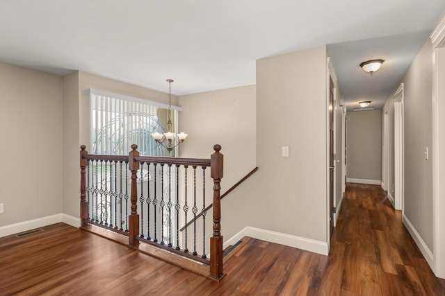 12925 E Valleyway Ave, Spokane Valley, WA 99216 - hall with a chandelier, wood finished floors, and an upstairs landing