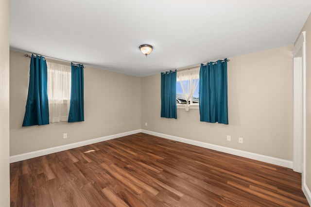 12925 E Valleyway Ave, Spokane Valley, WA 99216 - spare room featuring wood finished floors and baseboards