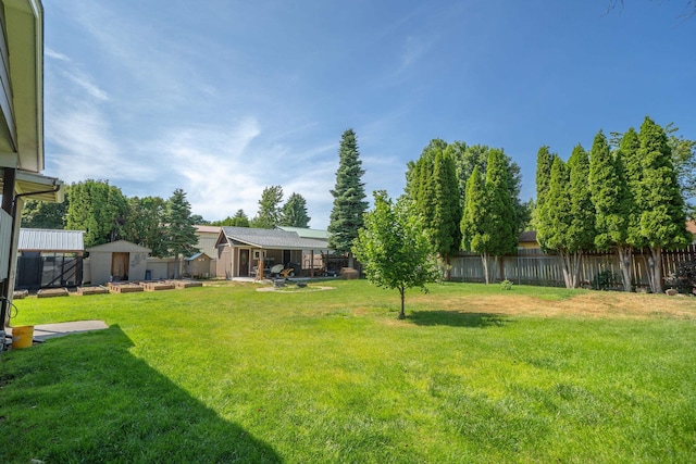 12925 E Valleyway Ave, Spokane Valley, WA 99216 - fenced backyard with a storage shed