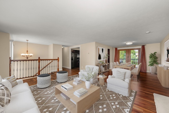 12925 E Valleyway Ave, Spokane Valley, WA 99216 - living area with a chandelier, wood finished floors, and french doors