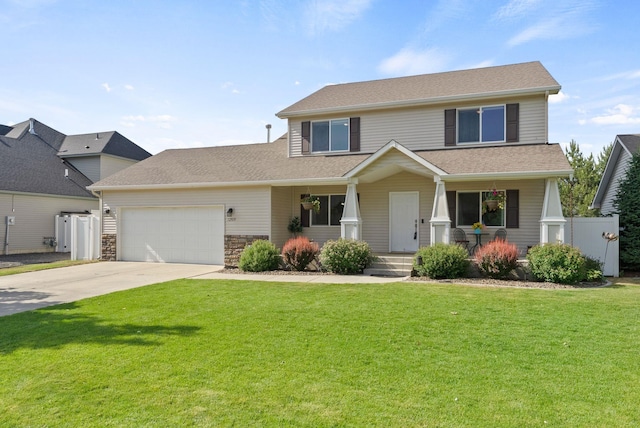 12919 E 39th Ln, Spokane Valley, WA 99206 - view of front of house with an attached garage, driveway, a porch, and roof with shingles