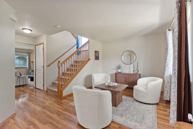12919 E 39th Ln, Spokane Valley, WA 99206 - living room featuring wood finished floors and stairway