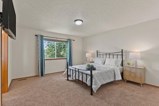 12919 E 39th Ln, Spokane Valley, WA 99206 - bedroom with light carpet and a textured ceiling
